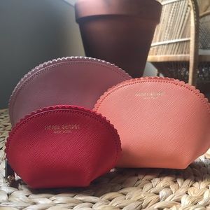Nesting trio of Henri Bendel cosmetic bags
